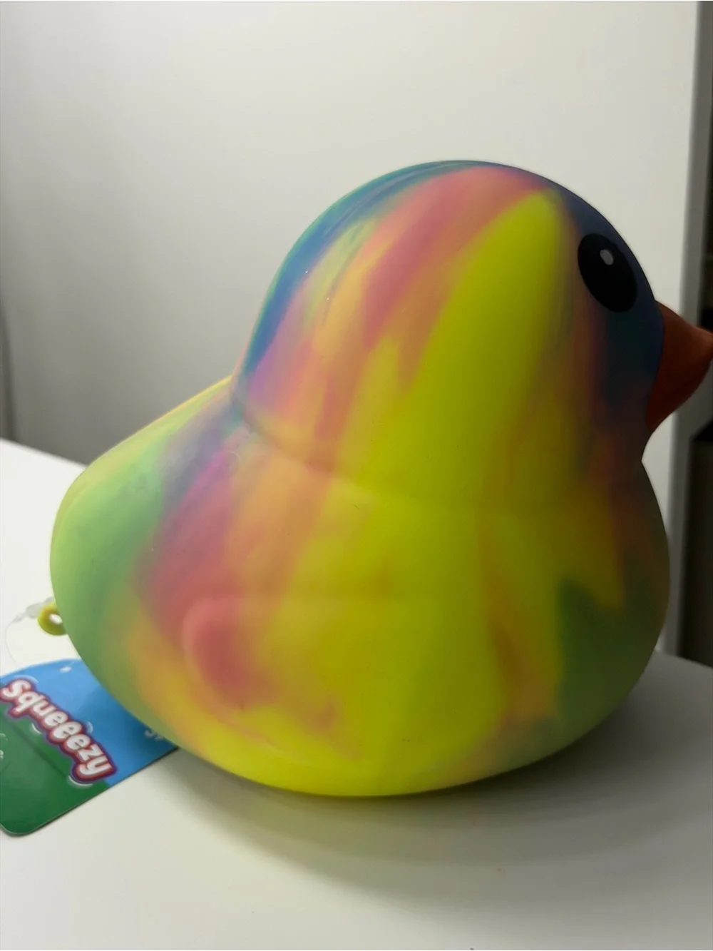 Brand new Squeeeezy Duck Rainbow Multicolor Rubber Bird Toy with Orange Beak